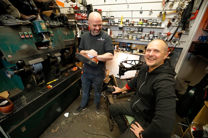 Cobblers Mark Jackman and 'Archie' Sakele at work. Photograph: Nick Bradshaw