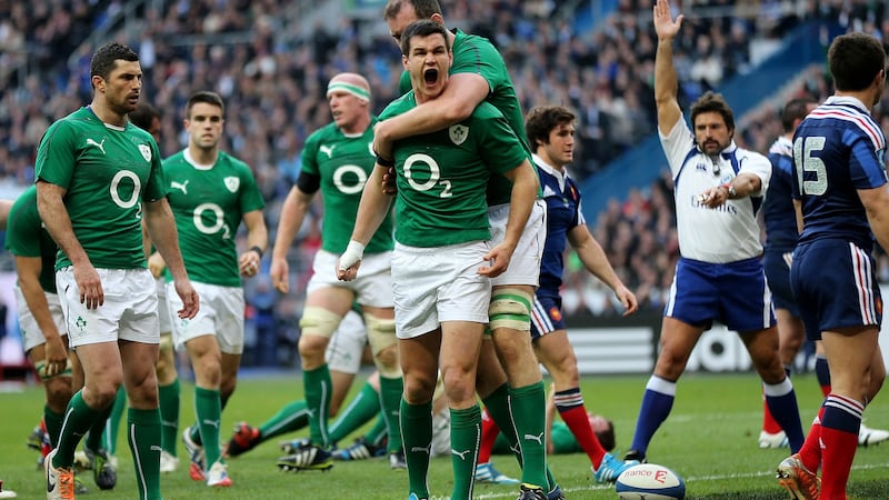 Johnny Sexton celebrates scoring the opening try in 2014. Photo: James Crombie/Inpho