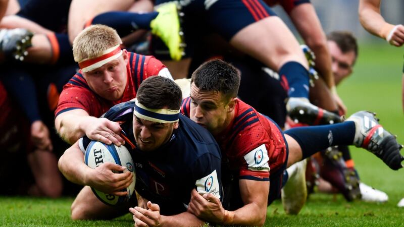 Edinburgh’s Stuart McInally is tackled short of the try line by Munster’s John Ryan and Conor Murray during the Heineken  Champions Cup quarter-final  at  Murrayfield. Photograph:  Ian Rutherford/PA Wire
