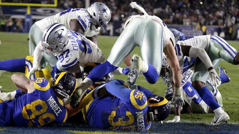 Rams running back CJ Anderson scores against the Cowboys in the second half. Photo: Mike Nelson/EPA