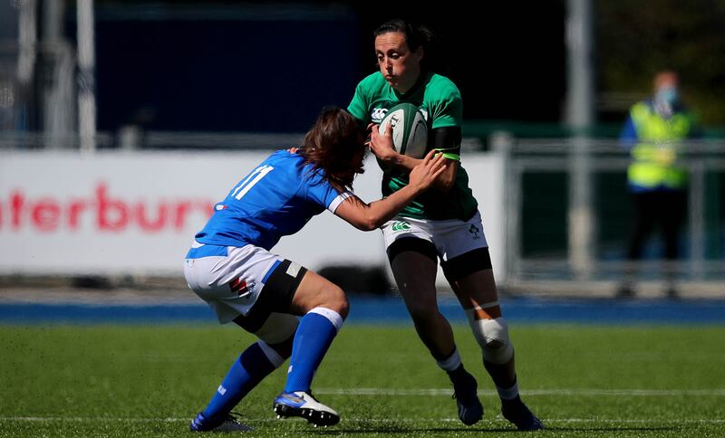 Ireland's Tyrrell is tackled by Maria Magatti of Italy in a 2021 Women's Six Nations Championship match at Energia Park. Photograph: Ryan Byrne/Inpho