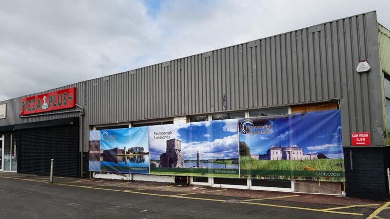 An empty shopping centre on the outskirts of Enniskillen on the road to Belcoo is decorated with large photo displays of the local picturesque scenery. The G8 summit will take place in nearby Lough Erne resort. Photograph: Bryan O’Brien