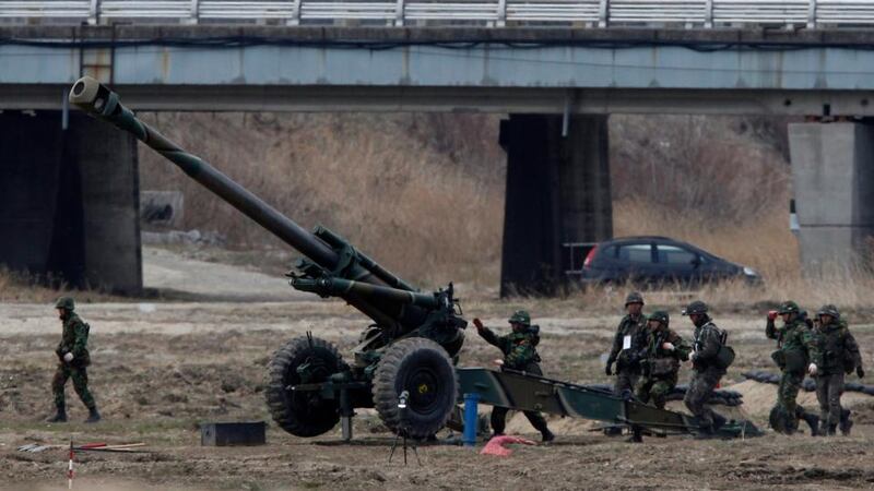 South Korean soldiers  take part in an artillery drill  near the demilitarised zone  in Goseong, about 330km  northeast of Seoul. Photograph: Kim Hong-Ji/Reuters