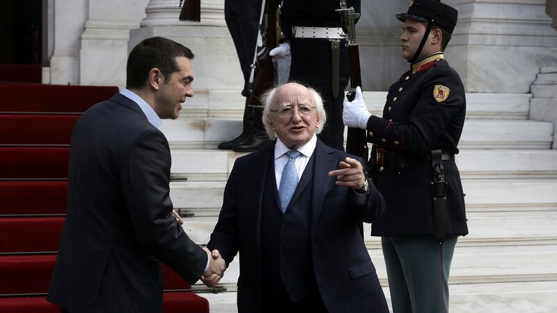 Greek prime minister Alexis Tsipras welcomes the President Michael D Higgins for a meeting at the Maximos Mansion in Athens. Photograph: Simela Pantzarti/EPA