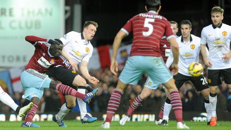 West Ham’s Cheikhou Kouyate (left) scores the opener against   Manchester United at the Boleyn Ground. Photograph: Gerry Penny / EPA