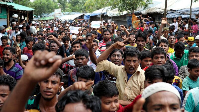 Rohingya refugees take part in a protest at the Kutupalong refugee camp to mark the one-year anniversary of their exodus in Cox’s Bazar, Bangladesh on Saturday. Photograph:  Mohammad Ponir Hossain/Reuters