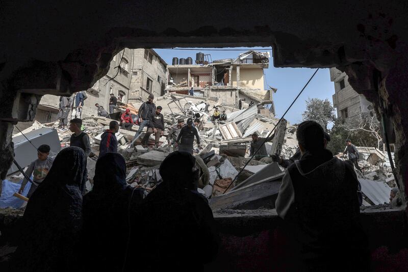 Building rubble in Rafah: Another Israeli air strike on Wednesday afternoon killed four Palestinians including a woman and a child, Gaza health authorities say. Photograph: Mohammed Abed/AFP via Getty