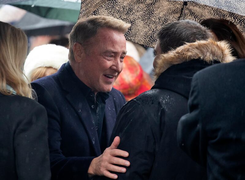 Michael Flatley  consoles a mourner  at the funeral of Lisa Murphy in the Church of St John the Evangelist, Ballinteer, Dublin. Photograph:  Colin Keegan/Collins Dublin