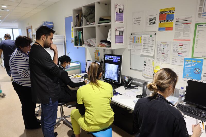 Staff at St. Luke’s. Despite the pressure, the work atmosphere is bustling and collegiate. Photograph: Dara Mac Dónaill