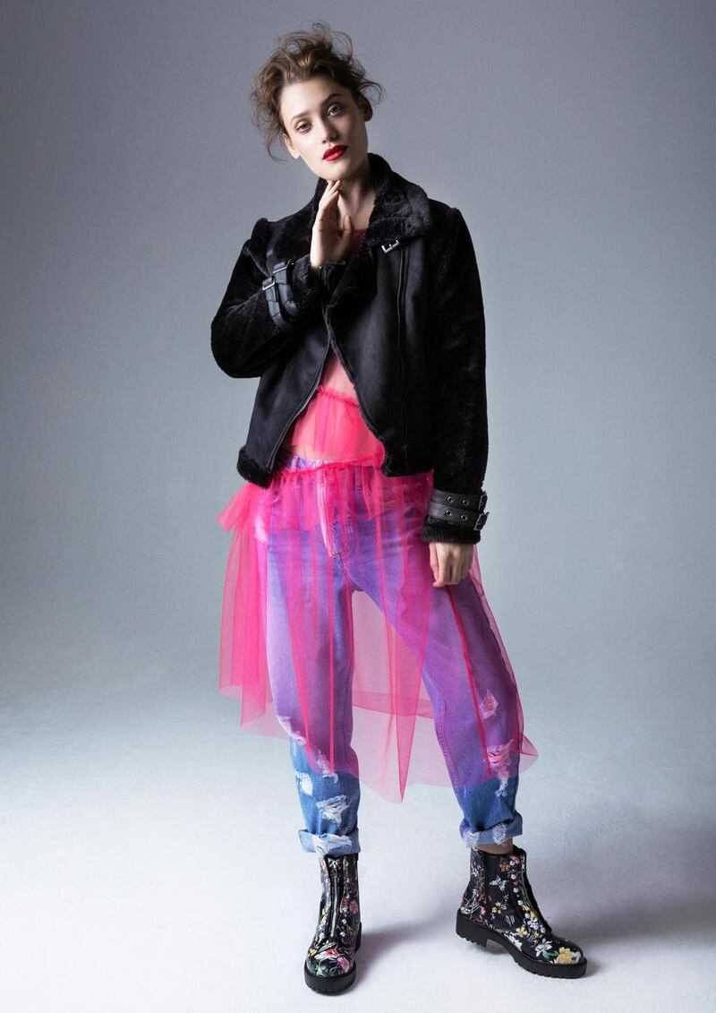 Faux fur sleeve aviator jacket €35, pink mesh overlay dress €14, cropped jeans €19.