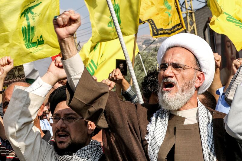 Muslim clerics chant slogans during an anti-Israel rally organised by supporters of Hizbullah in the Lebanese city of Nabatieh on Friday. Photograph: Mahmoud Zayyat/AFP via Getty Images