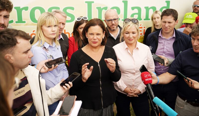 With Michelle O'Neill by her side, Mary Lou McDonald effortlessly fielded a very wide range of questions surrounded by satellites Claire Kerrane, Brian Stanley and Kathleen Funchion. Photograph: Niall Carson/PA