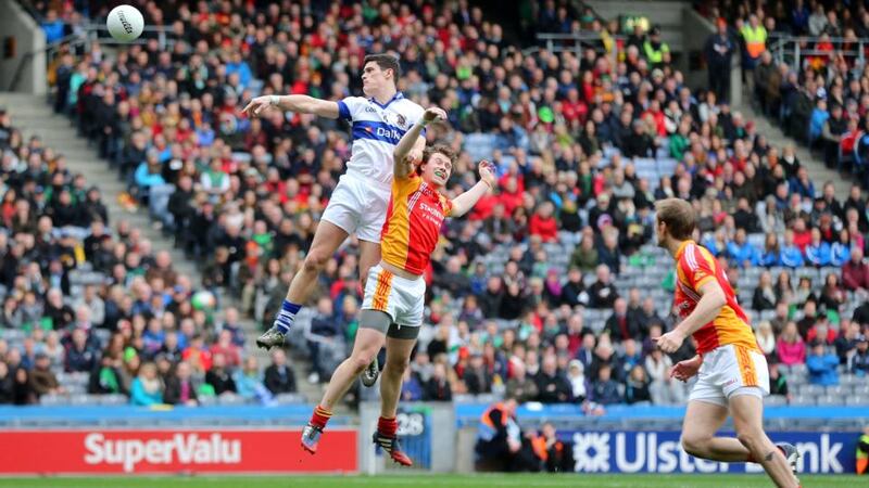 Diarmuid Connolly scores his second goal of the All-Ireland club football final despite the efforts of Castlebar Mitchels’ Eoghan O’Reilly at Croke Park. Photograph: Cathal Noonan / Inpho