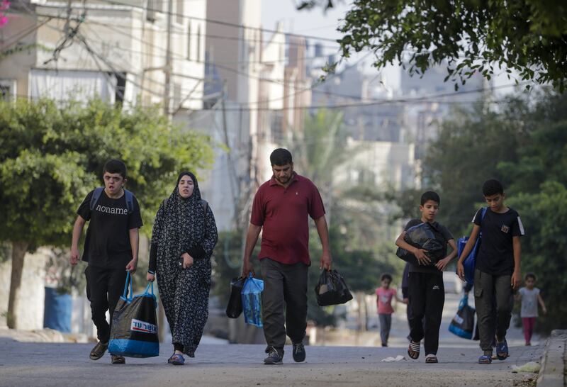 Residents of Gaza City fleeing on Saturday following an Israeli warning of increased military operations in the Gaza Strip. Photograph: Mohammed Saber/EPA