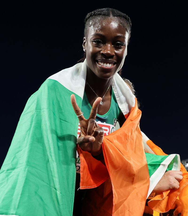 Rhasidat Adeleke celebrates winning a silver medal after the women's 4x400m relay final. Photograph: Morgan Treacy/Inpho