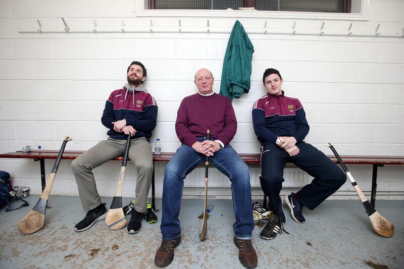 Former Antrim manager Terence 'Sambo' McNaughton with his two sons Shane and Christy At Ruairí Óg GAA Club, Cushendall in 2016, when they last reached the All-Ireland club final. Photograph: Jonathan Porter/Presseye/Inpho 