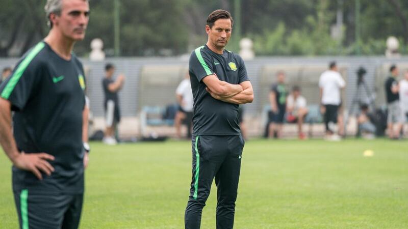 Jim McGuinness and head coach Roger Schmidt observing a training session of Beijing Sinobo Guoan in Beijing, China. Photograph: VCG/VCG via Getty Images