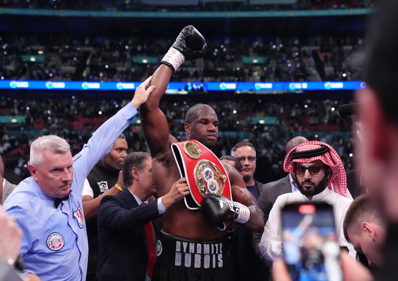 Daniel Dubois celebrates victory over Anthony Joshua following the IBF World Heavy weight bout at Wembley Stadium, London. Photograph: Bradley Collyer/PA 
