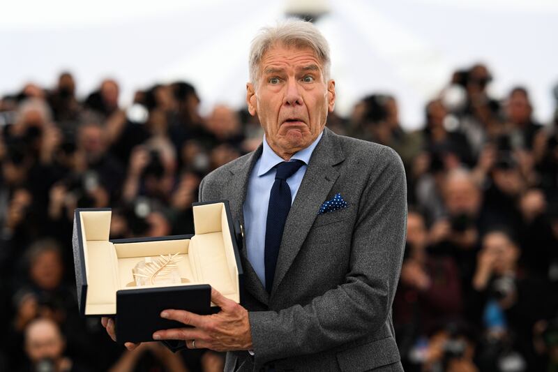 Ford poses with his Honorary Palme d'Or at this year's Cannes Film Festival. Photograph: Patricia de Melo Moreira/AFP via Getty
