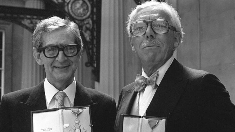 Denis Norden and Frank Muir with their CBEs at Buckingham Palace. Photograph:  PA