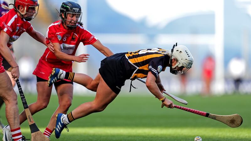 Kilkenny’s Shelly Farrell is tackled by Julia White of Cork during the All-Ireland camogie final at Croke Park. Photo: Laszlo Geczo/Inpho