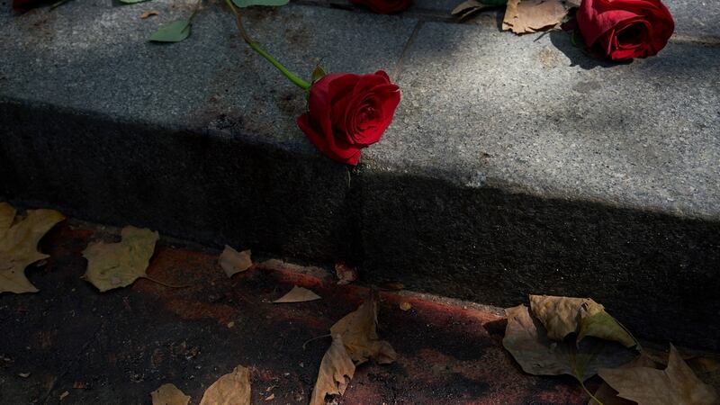 Flowers placed near blood stains on Las Ramblas, where a terror attack killed 13 people  in Barcelona. Photograph: Samuel Aranda/The New York Times.