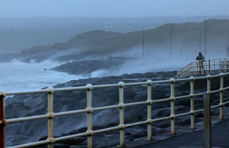 Storm Éowyn batters the Lahinch coastline, in Co Clare,  with a low tide saving the town from major damage.
Photograph: Alan Betson/The Irish Times

