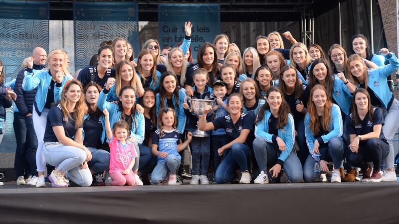 The Dublin women’s team celebrating their three-in-a-row with fans at Merrion Square. Photograph: Dara Mac Dónaill/The Irish Times