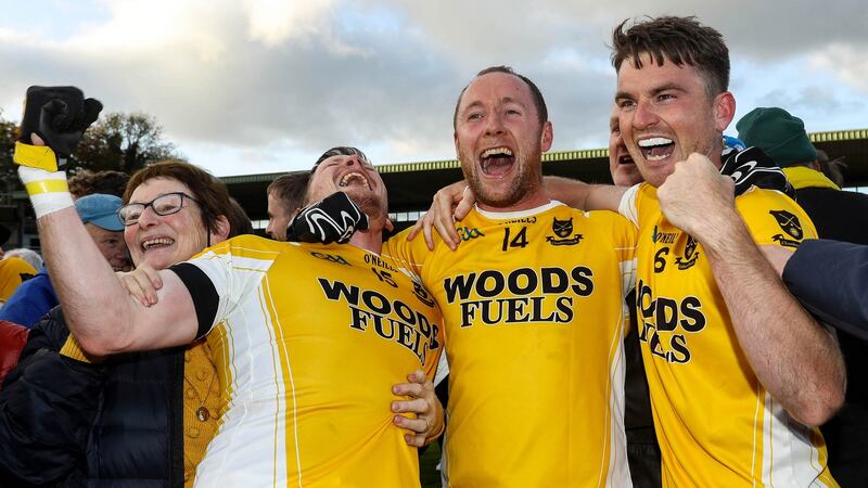 Clontibret’s Conor McManus, Vincent Corey and Dessie None celebrate after the game. Photograph: Lorraine O’Sullivan/Inpho