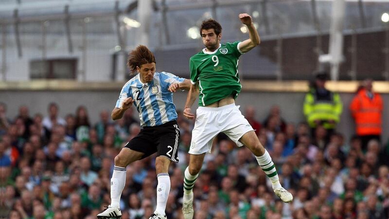 Cillian Sheridan in action for Ireland against Argentina’s Martin Demichelis during an international friendly in August 2010. Photograph: Dan Sheridan/Inpho