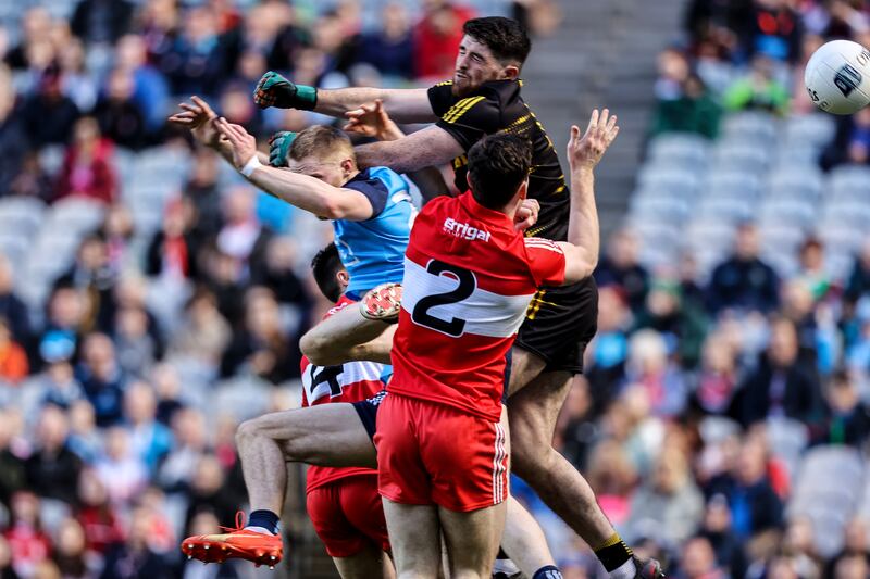 Dublin's Con O’Callaghan fists in a goal past Derry goalkeeper Odhran Lynch. Photograph: Ben Brady/Inpho