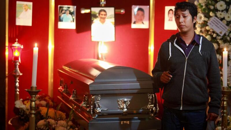 Jorge Sanchez, son of Moises Sanchez, speaks during his father’s funeral. Photographs: Felix Marquez