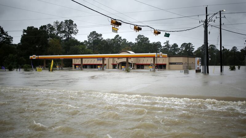 A Shell petrol station stands in Hurricane Harvey floodwaters in Spring, Texas. Floodwaters left Houston immersed and helpless, crippling a global centre of the oil industry and testing the economic resiliency of a state that’s home to almost one  in 12 US workers. Photographer: Luke Sharrett/Bloomberg