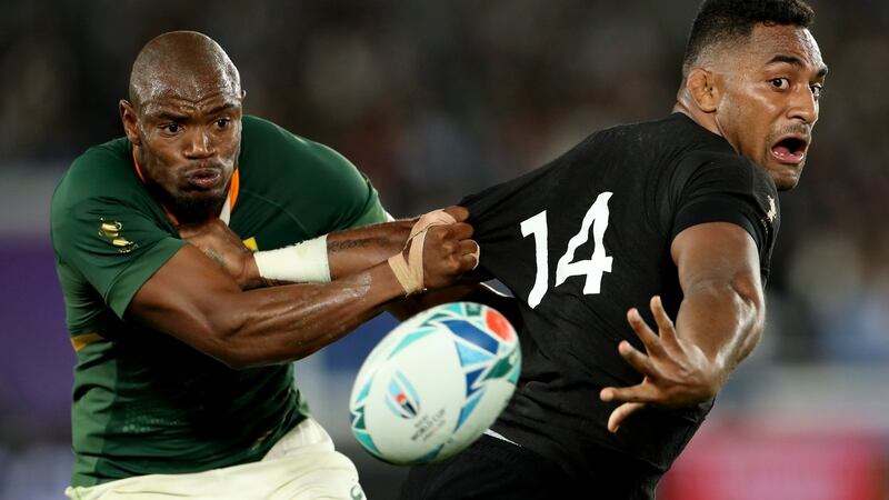 New Zealand’s Sevu Reece offloads the ball during the Rugby World Cup Group B game between New Zealand and South Africa at the International Stadium in Yokohama. Photograph: Hannah Peters/Getty Images