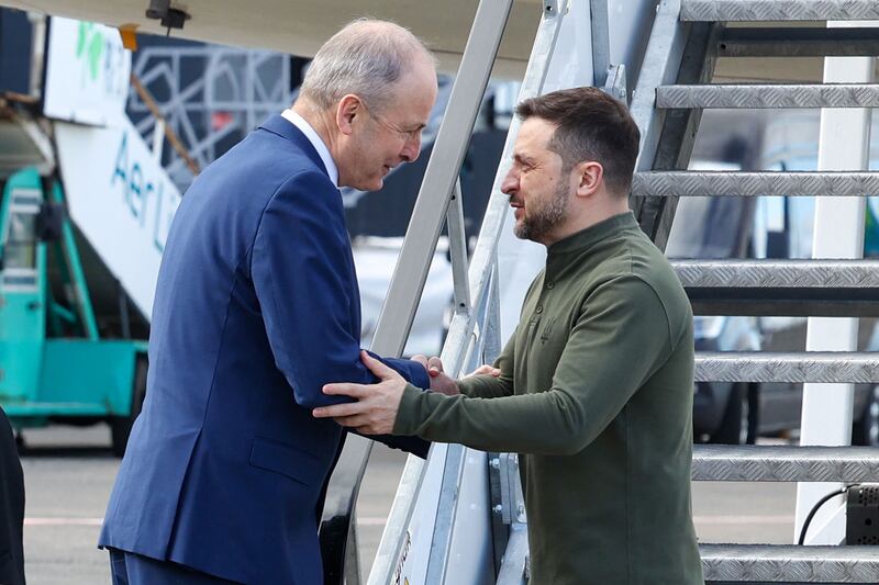 Taoiseach Micheál Martin with Ukraine's President Volodymyr Zelenskiy as he disembarks from an aircraft after landing at Shannon Airport. Photograph: Government Information Service/Getty