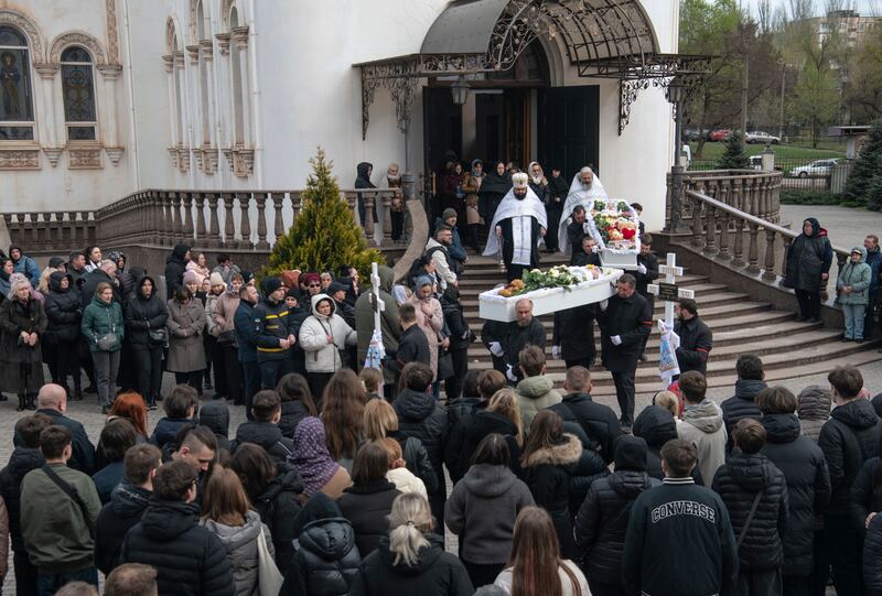 Mourners at the funerals of 15-year-olds Danylo Nikytskyi and Alina Kutsenko, who were killed in the Russianair strike on Kryvyi Rih last Friday. Photograph: Maxym Marusenko/EPA-EFE