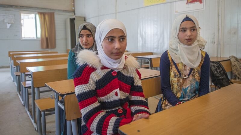 Isra, Ala’a and Waam, who have all lived in the Zaatari refugee camp for six years. Photograph: Peter Biro/European Union 2018