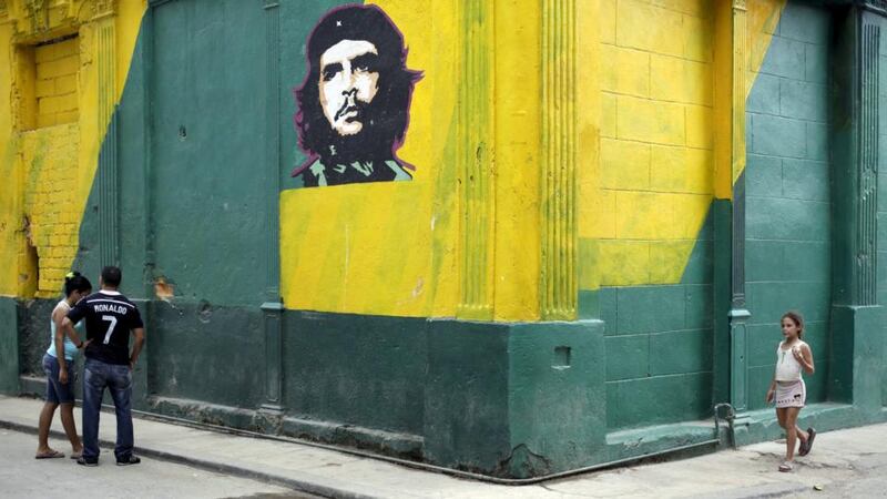 An image of revolutionary hero Ernesto Ché Guevara is seen on a street in Havana. US president Barack Obama met Cuban president Raul Castro on Saturday in the highest-level talks between the two countries in nearly 60 years. Photograph: Enrique de la Osa/Reuters