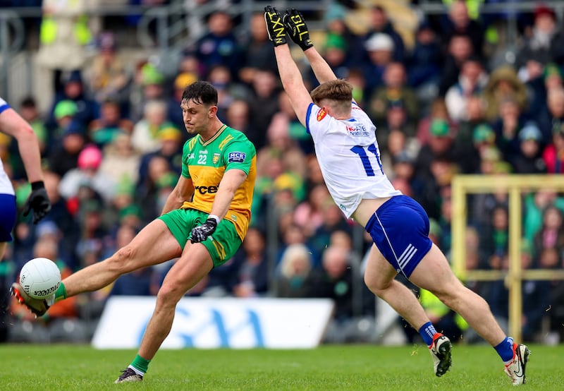 Monaghan's Mícheál Bannigan blocks a shot from Michael Langan of Donegal at Clones. Photograph: Leah Scholes/Inpho