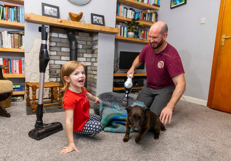 Michael and Clodagh giving Ralph’s bed a deep clean using the hand-held device while the main body has been cleverly designed to stand freely