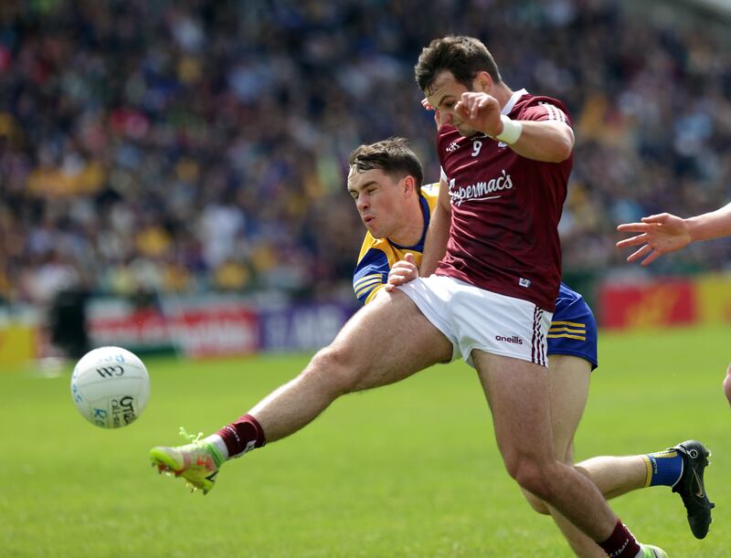 Galway's Cillian McDaid is challenges by Roscommon's David Murray during the Connach SFC Final at Pearse Stadium in Salthill. Photograph: John McVitty/Inpho    