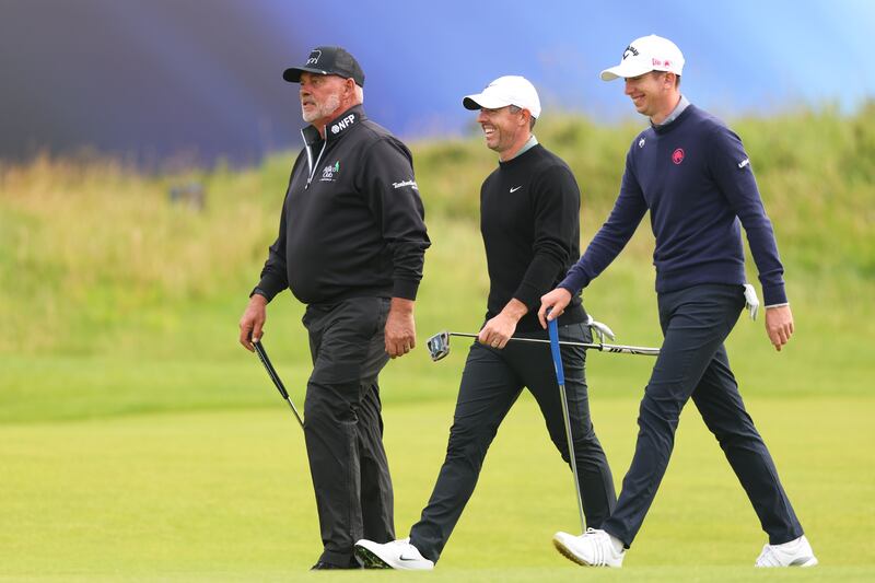 Darren Clarke, Rory McIlroy and Tom McKibbin on the 18th at Portrush. Photograph: Ben Brady/Inpho
