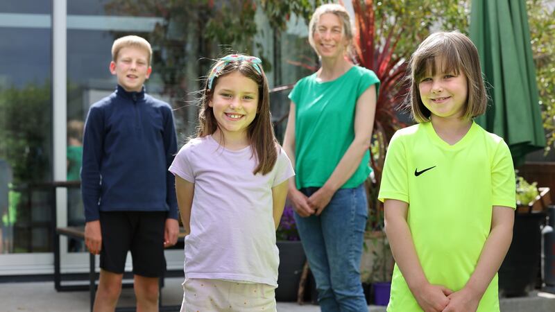 Martha Killion, right, with, from left, Henry, Rose, and her mother, Emma. Martha  has quite a severe reaction to any gluten, vomiting and feeling very flat for hours afterwards.  Photograph: Dara Mac Dónaill