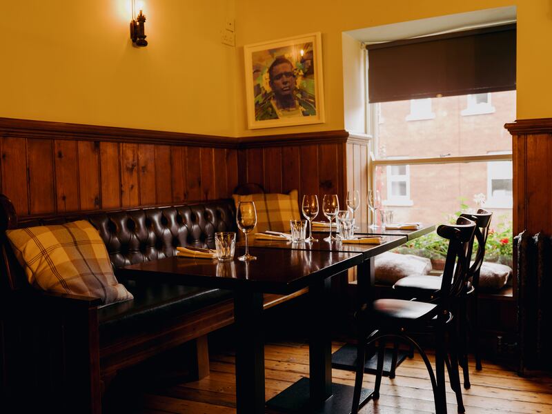  The upstairs dining room at Spitalfields in Dublin. The room retains the feel of a traditional Irish pub. Photograph: Ellius Grace/the New York Times