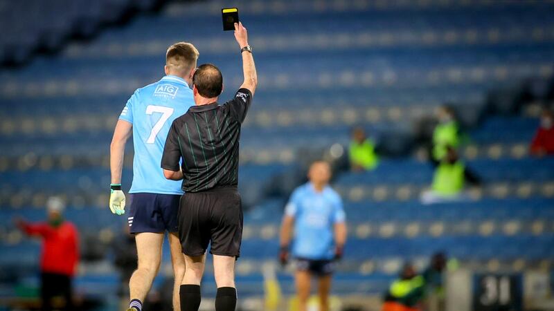 Robert McDaid is shown a black card by referee David Coldrick. Mayo had been so brave up to this point and maybe it was the time to just go for it.  But they  opted to play it safe  and  elected  for a sweeper in Michael Plunkett. Photograph: James Crombie/Inpho