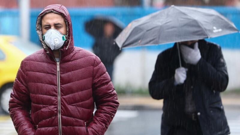 A man wears a protective mask in Tehran, Iran. Photograph: Nazanin Tabatabaee/WANA via Reuters