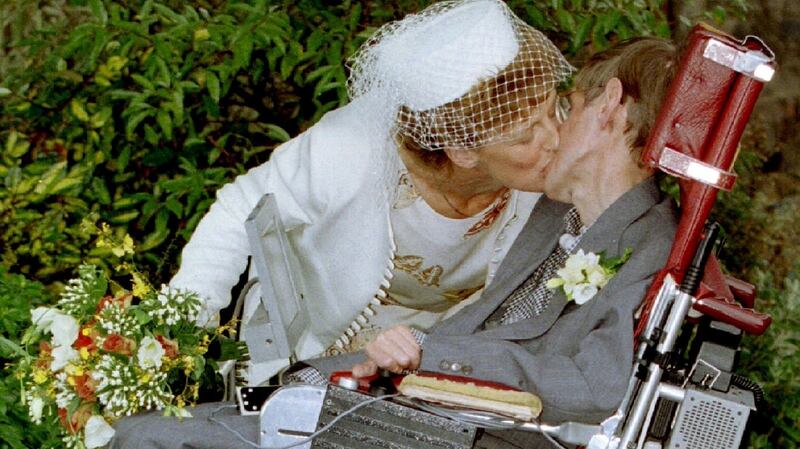 A kiss for scientist and theorist Stephen Hawking from his new bride Elaine Mason after their civil wedding in September 15th, 1995. Photograph: Paul Bates