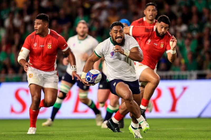 Ireland's Bundee Aki bursts through against Tonga. Photograph: Dan Sheridan/Inpho