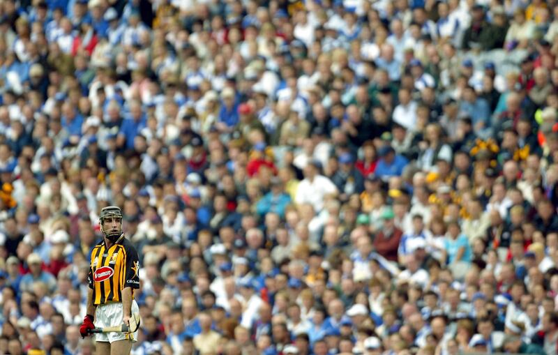 DJ Carey stands over a free during the 2004 All-Ireland hurling semi-final win over Waterford. '“People were talking about me getting money for coming back,” he said in a Sunday Times interview in 1999. “I had family sitting in the stand [at matches] listening to opposition supporters shouting, ‘Pull across him, he’s getting paid for it, he deserves it.’ It is so stupid.” Photograph: Patrick Bolger/Inpho 