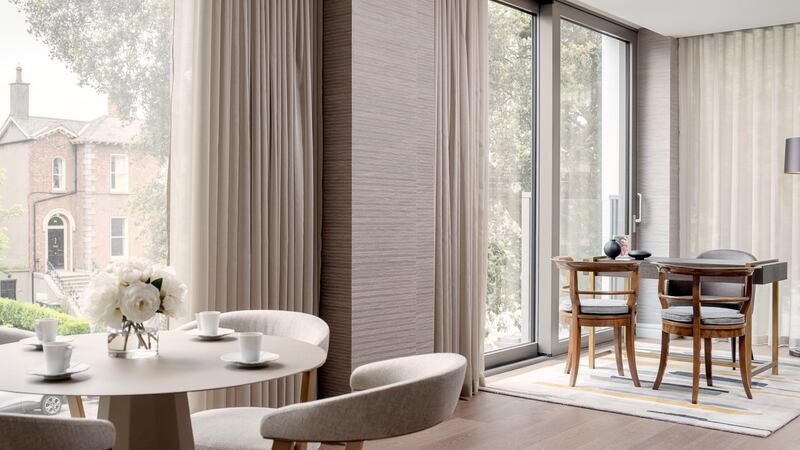 Sun room with Juliet balconies.